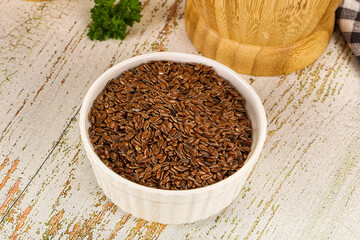 Brown flax seeds in the bowl