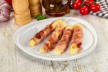 Hot mozzarella sticks with bacon