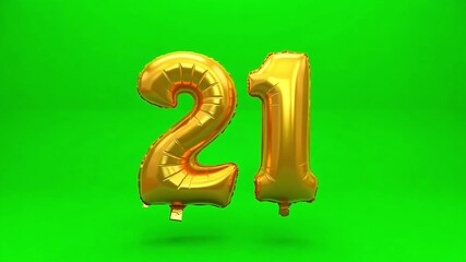 Golden balloon '21' floating on green background, celebrating a 21st birthday party
