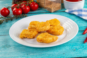 Golden crispy fried chicken nuggets