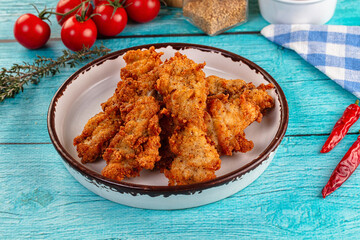 Golden crispy fried chicken strips