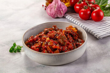 Roasted chicken hearts with vegetables