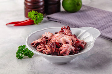 Marinated canned mini baby octopus