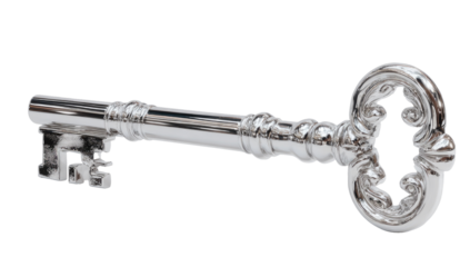 Detailed close-up of a long, ornate, silver key