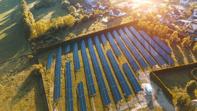 Sustainable Neighborhood with Solar Panels on Green Lawns