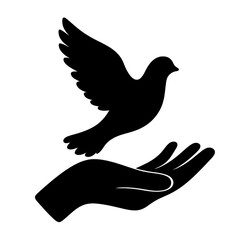 Obraz premium Emotional Tribute to Ancestors Hand Releasing Bird as Symbol of Freedom and Peace International Day For The Abolition of Slavery Concept