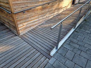 inclined plane instead of stairs. Ramps permit wheelchair users, pushing strollers cart wheeled...