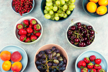 Mix of ripe colorful berries and fruits.