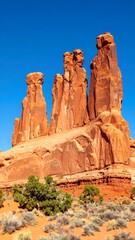 Fototapeta premium Red rock formations against a clear sky