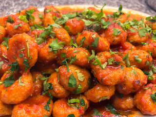 Close-Up of Homemade Turkish Fellah Köftesi, Bulgur Meatballs in Tomato Sauce