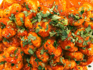 A Rich Dish of Turkish Bulgur Meatballs (Fellah Köftesi) Garnished with Parsley