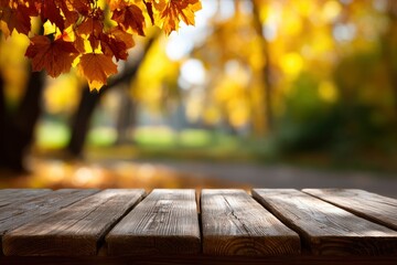 Wooden table overlaid on an autumn scene with yellow leaves