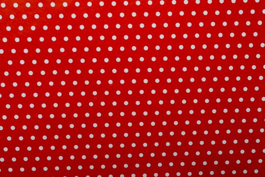 Top view of white and red Polka dot background