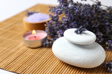 Spa composition with lavender flowers in spa room - beauty treatment
