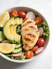 Grilled Chicken Bowl. Grilled chicken breast, lettuce, avocado, cucumber, radish, cherry tomatoes. Drizzle with olive oil and lemon juice
