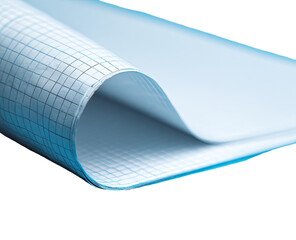 Close-up of a sheet of graph paper, light blue, curved