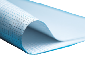 Close-up of a sheet of graph paper, light blue, curved