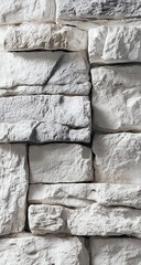 Close-up view of a textured white stone wall