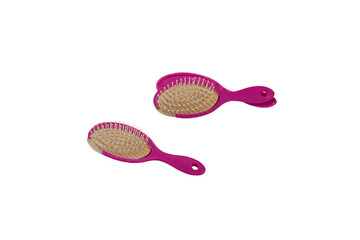 broken hairbrush isolated, pink hairbrush broken on white background