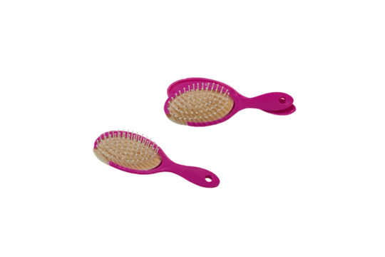 broken hairbrush isolated, pink hairbrush broken on white background