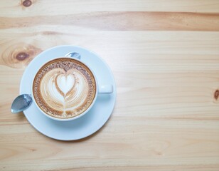 Obraz premium Latte Art Heart Coffee Cup on Wooden Table Top View