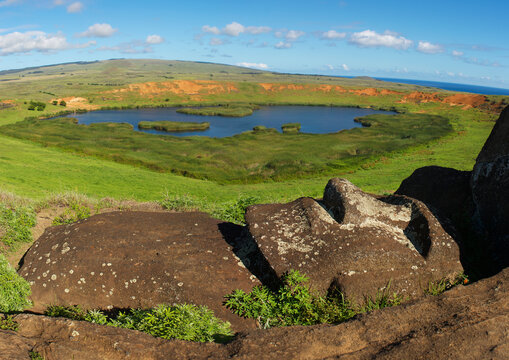 Lying moai over rano raraku lake, Easter Island, Hanga Roa, Chile