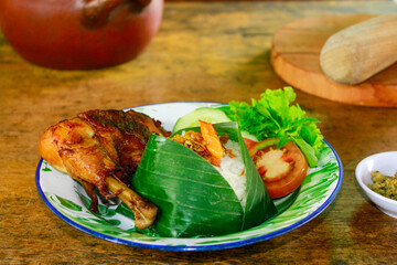 Indonesian nasi liwet and fried chicken