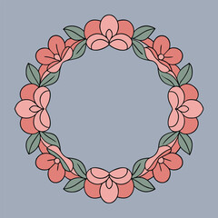 Coral pink floral wreath with green leaves on grey background