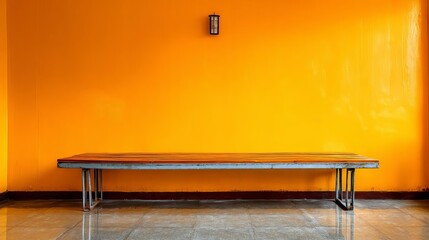 Fototapeta premium A minimalist bench against a vibrant orange wall in a modern space.