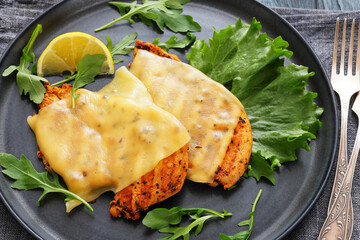 grilled chicken breast topped with melted cheese