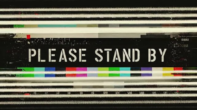 A retro television screen displaying the message "PLEASE STAND BY" with color bars.