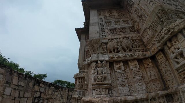 Architectural Detail of Meera Temple’s Carved Wall Featuring Mythological Reliefs in Chittorgarh