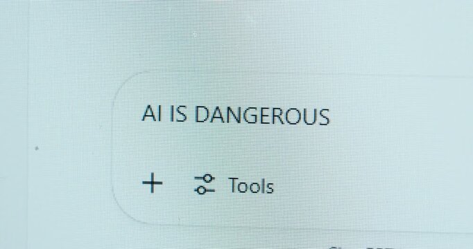 A bold statement appears on screen as a user types &ldquo;AI IS DANGEROUS!&rdquo; into a chat window, highlighting concerns about artificial intelligence and ethical risks.
