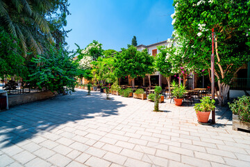 Outdoor restaurants and cafes on one of the streets of the Turkish part of Nicosia near the Selimiye Mosque, Cyprus.