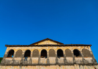 Maison Varlet old french colonial house against the sky, Sud-Comoé, Grand-Bassam, Ivory Coast
