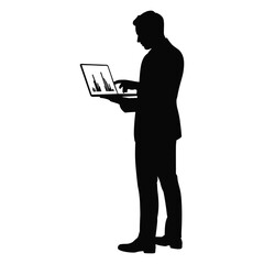 Silhouette of a man in a suit using a laptop computer