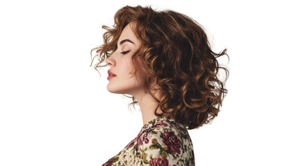 A woman with curly hair facing sideways, expressing tranquility and peace.