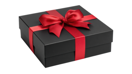 Elegant black gift box with a vibrant red ribbon and bow, isolated on white background.