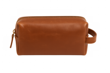 Compact brown leather toiletry bag featuring gold zipper, sitting on transparent surface, ideal for travel grooming essentials