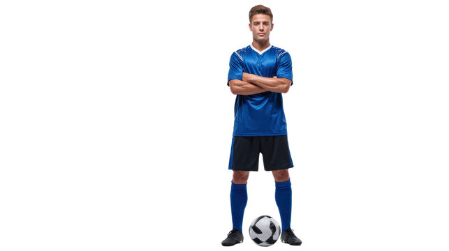 Young soccer player in blue uniform, standing confidently beside a soccer ball on white isolated background.