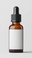 Amber glass dropper bottle with black dropper and white label