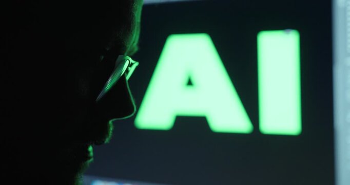 A man in the dark using AI for criminal activities