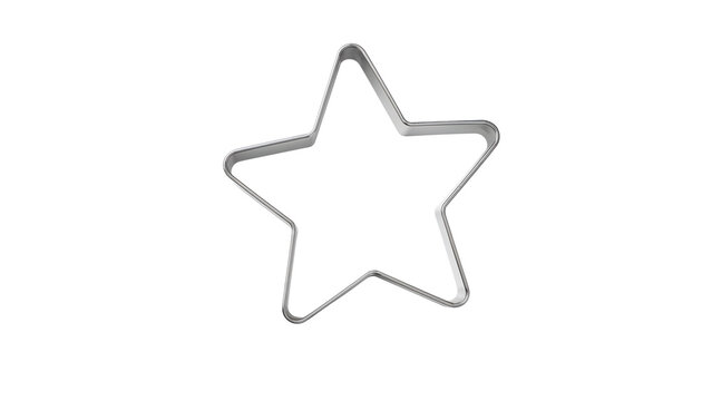 Metallic starshaped cookie cutter on isolated background for baking and kitchen concepts