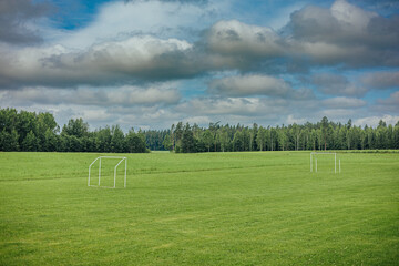 Soccer Field with Goalposts in a Rural Landscape