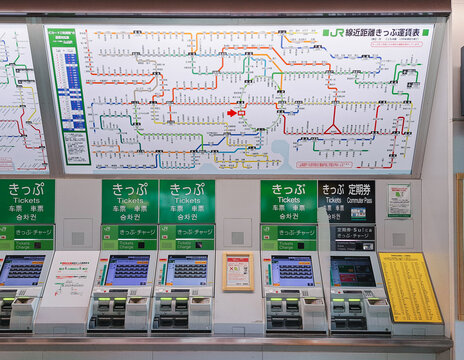 Tokyo, Japan- Nov 5, 2024 : Train ticket machine at train station with JR line map Tokyo public transportation 