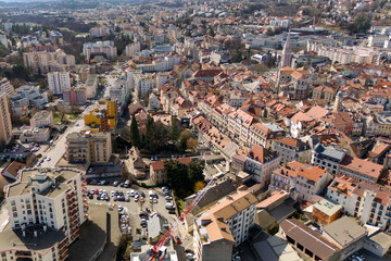 Drone view of a dense urban neighborhood in a southeastern French city with mixed architecture,...