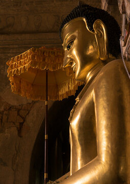 Golden buddha inside a temple, Bagan, Myanmar
