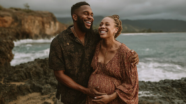Joyful couple expecting a child, embracing outdoors with a scenic ocean backdrop. Happy, natural moment of love and anticipation.