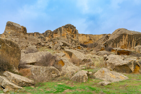 Wide shot of Gobustan rocks against a nice blue sky
