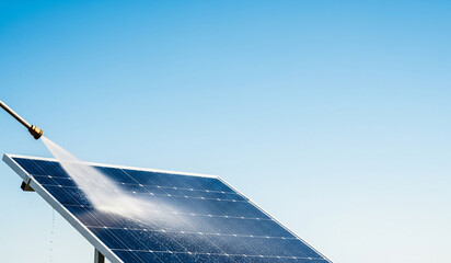 minimal composition of solar panel being cleaned with water spray and branding space